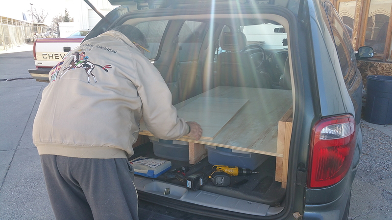 Jim Riggio working on the van